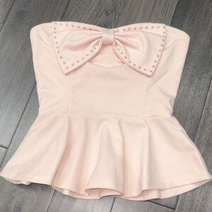 Elegant Strapless peplum Top with Bow Detail and rose gold like hardware studs